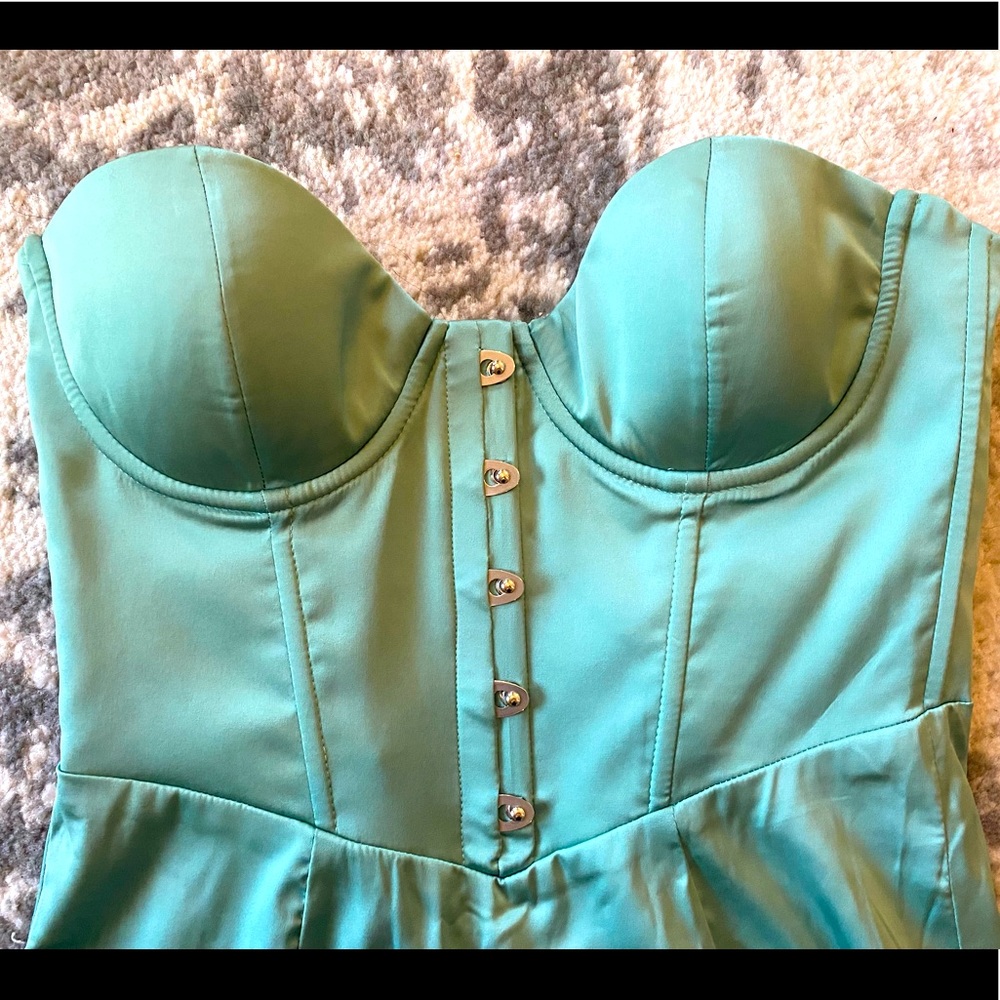Selling this beautiful brand new with tags corset dress.